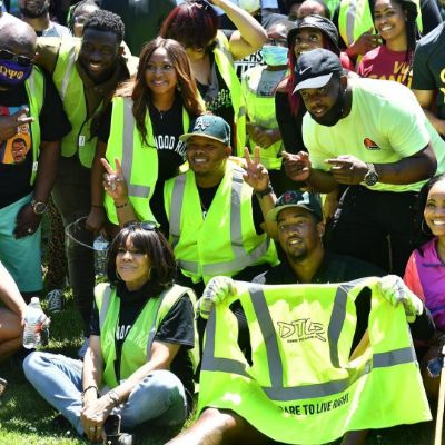 Sinqua Walls and DTLR members posing for a photo shoot. 
